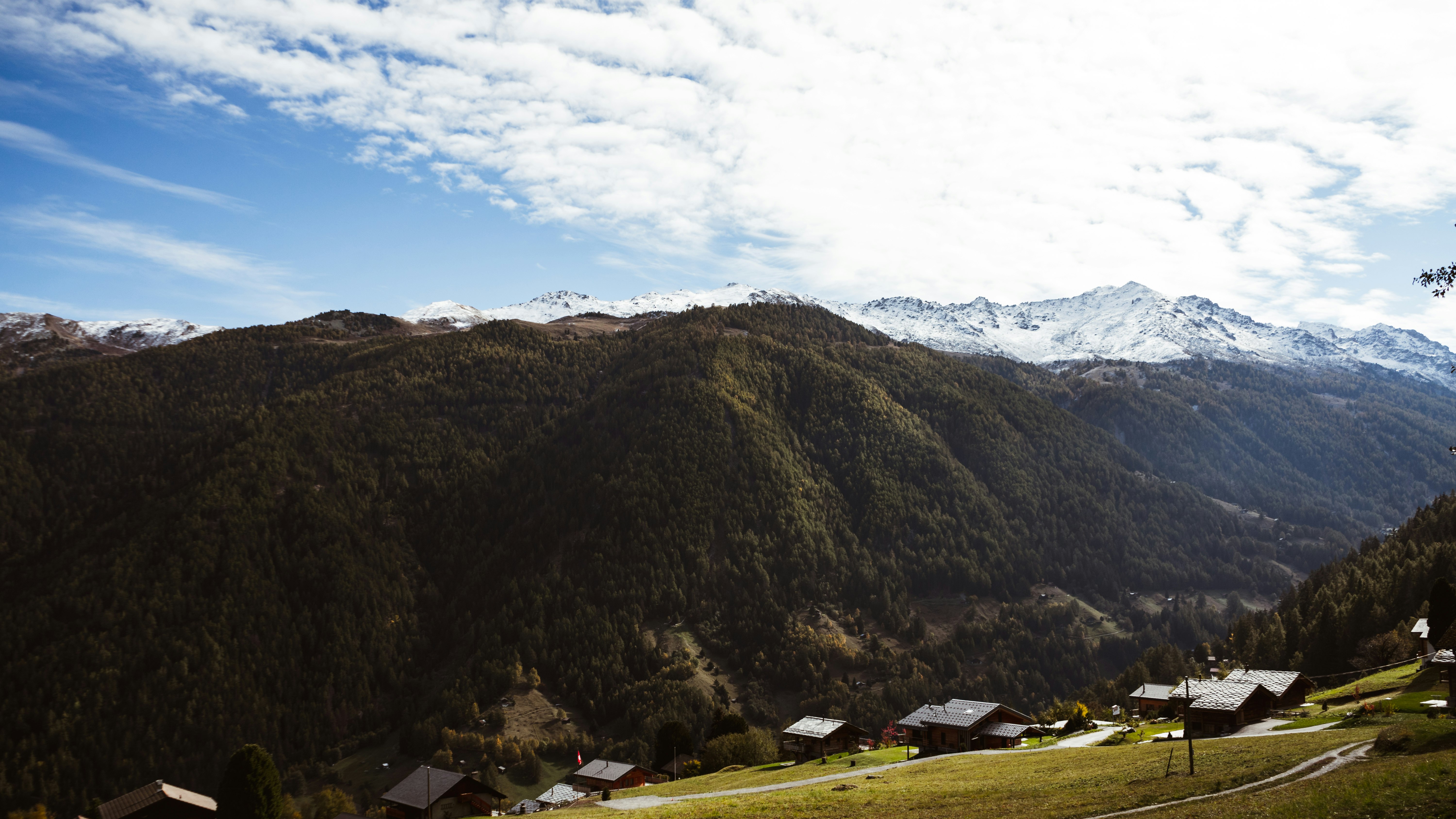 green and brown mountains under blue sky during daytime